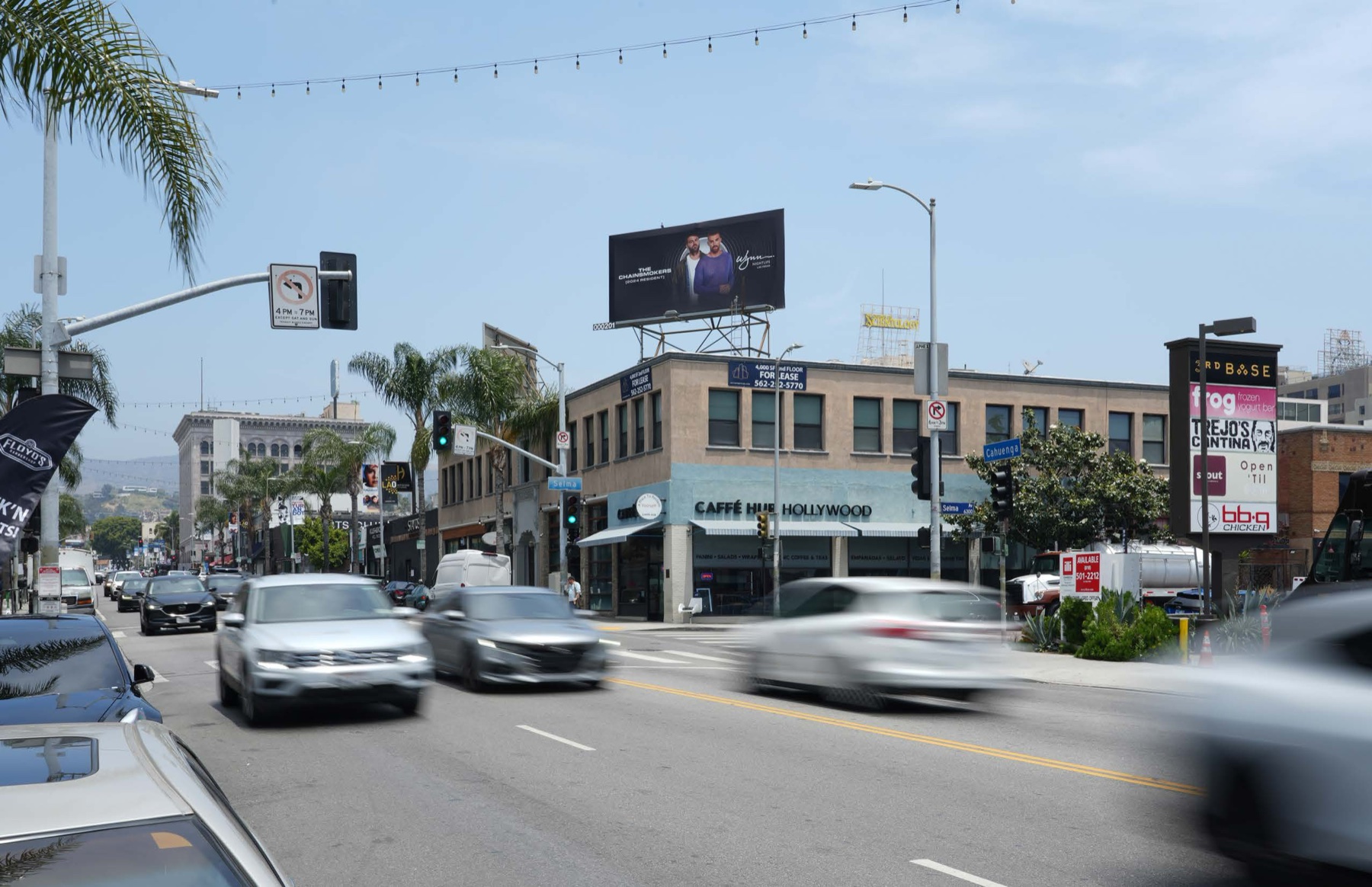 Existing condition: the static billboard above the corner, viewed northbound on Cahuenga Boulevard.