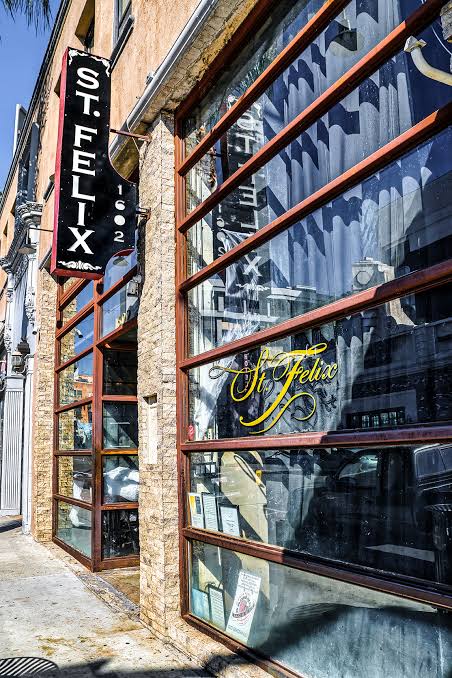 The St. Felix blade sign and storefront glazing at 1602 N Cahuenga Boulevard.